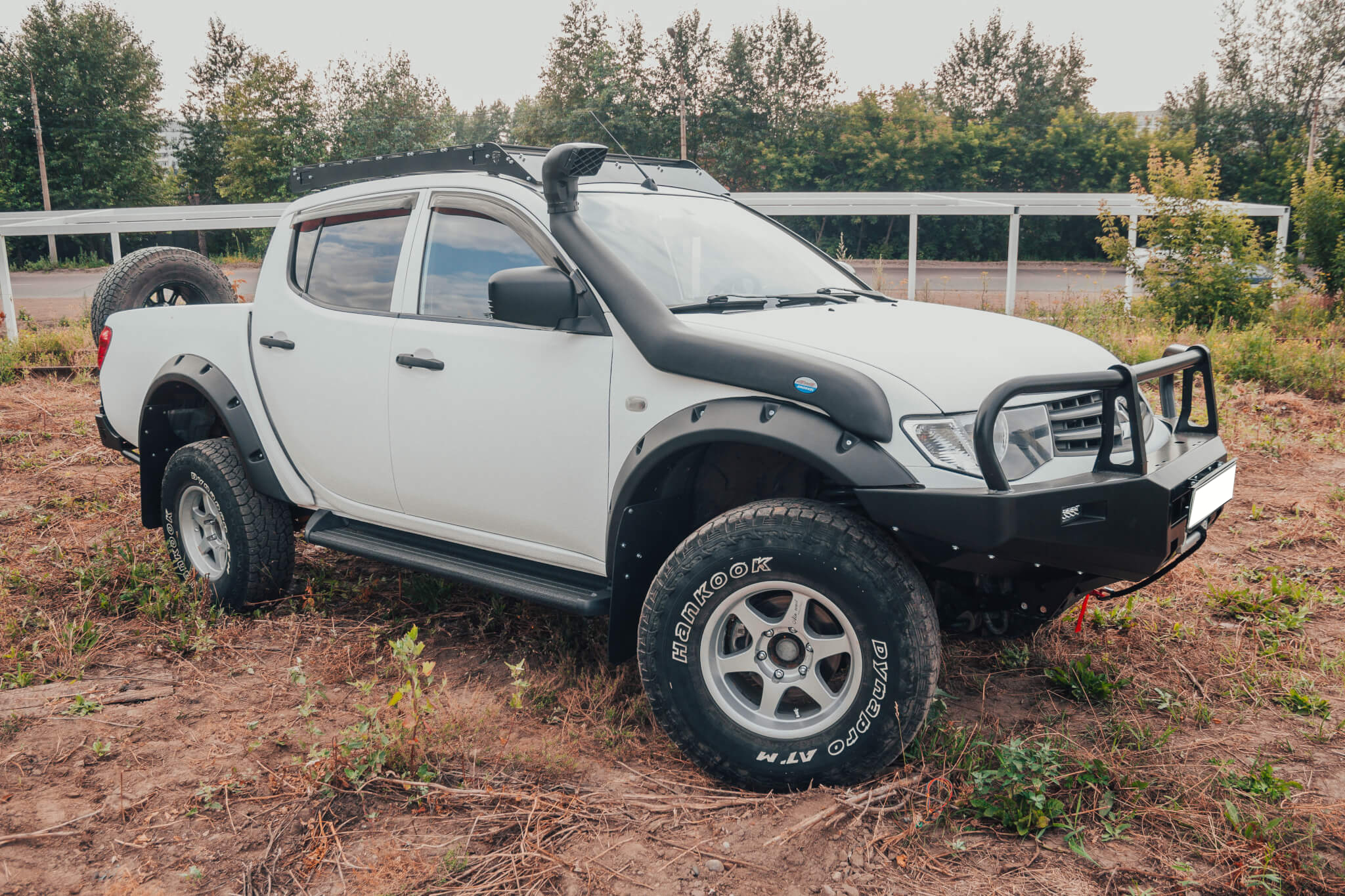 Бампер силовой передний STC Mitsubishi Pajero Sport 2008-2015/L200 2013-2015 c защитой фар и противотуманными фарами — изображение 4