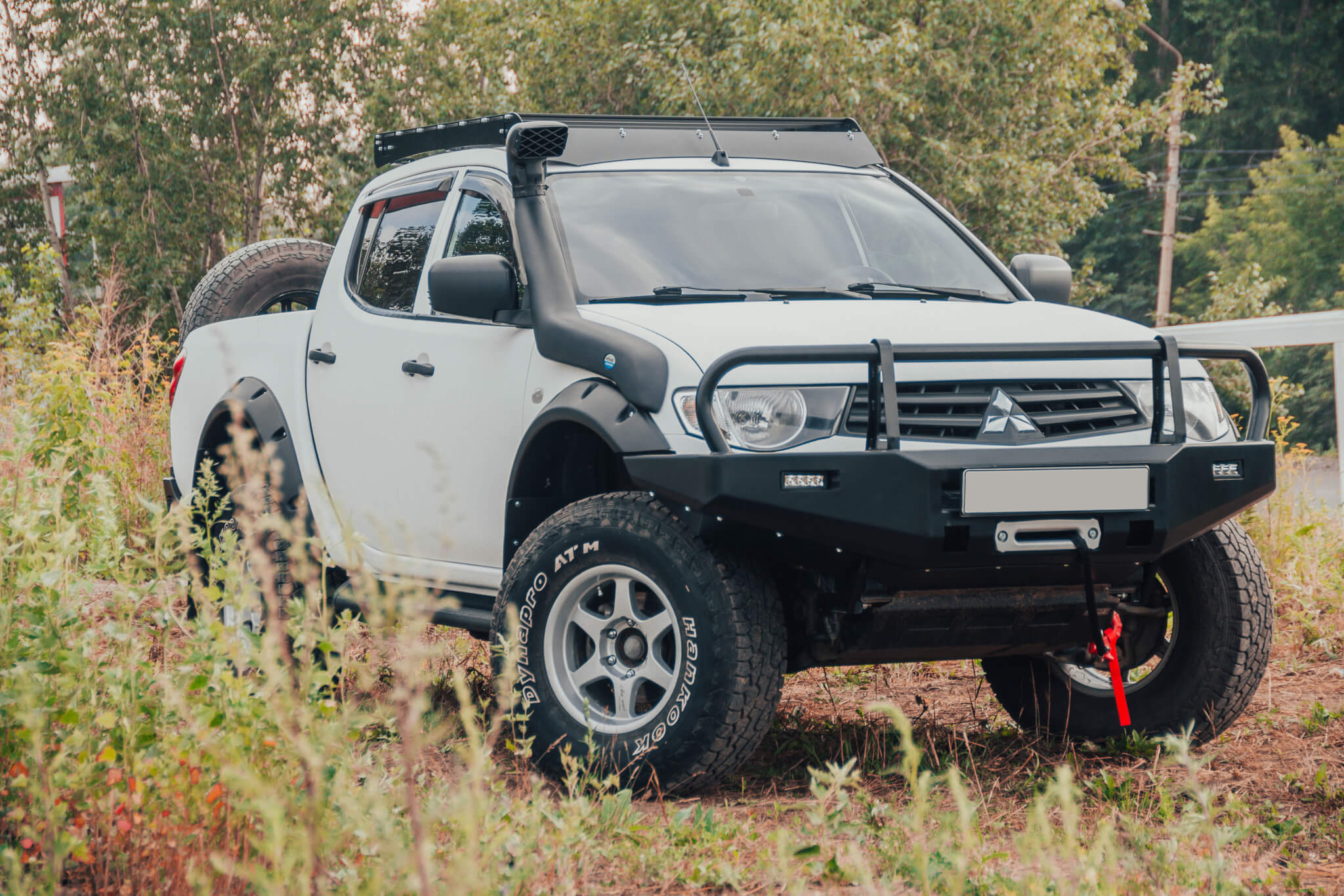Бампер силовой передний STC Mitsubishi Pajero Sport 2008-2015/L200 2013-2015 c защитой фар и противотуманными фарами