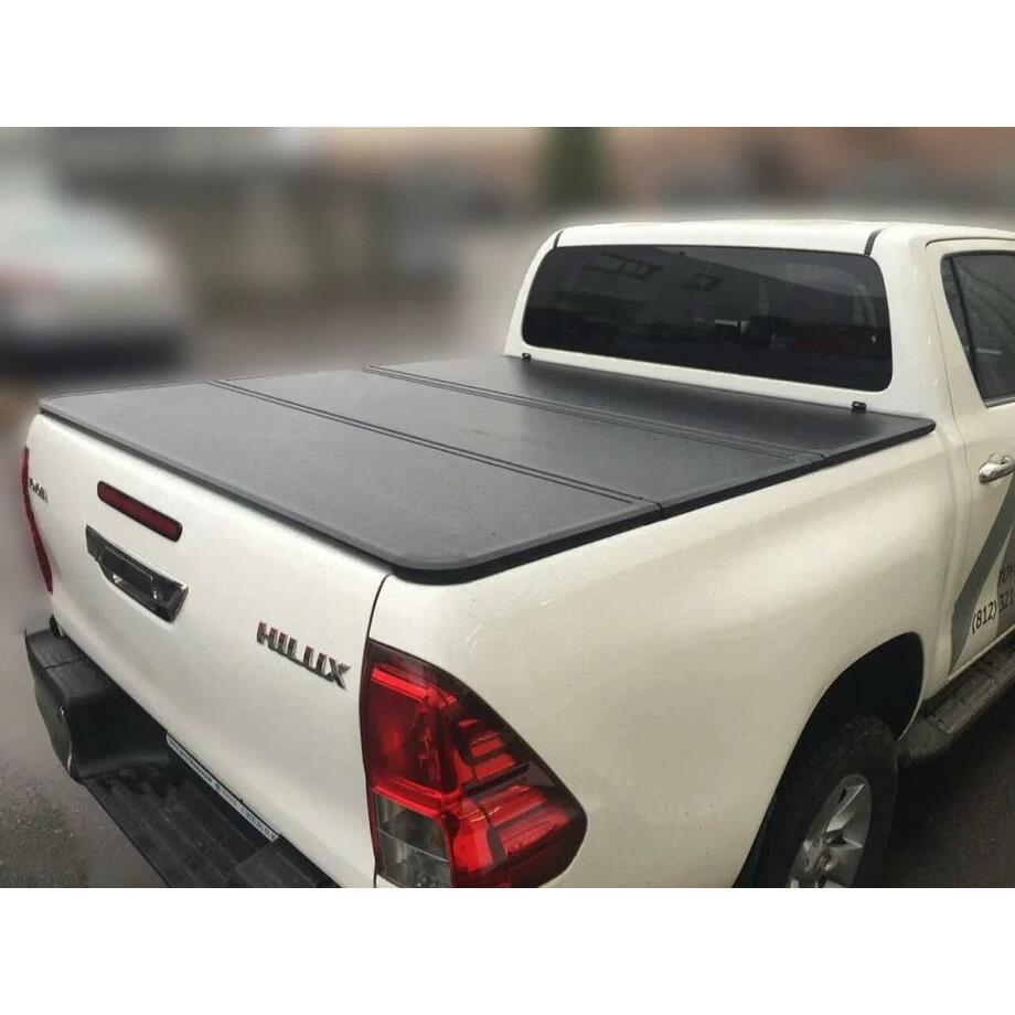 Крышка алюминиевая четырехсекционная Winbo на Toyota Hilux Revo (2015-2021) — изображение 2