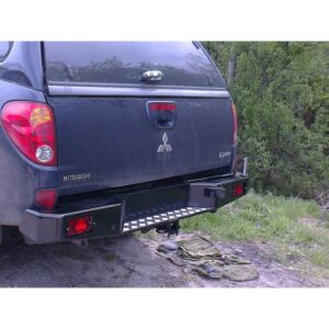 Задний бампер Mitsubishi L200 New НИИС